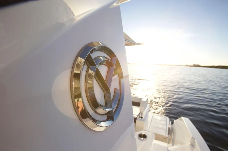  Yacht Photos Pics 2026 Cruisers Yachts 42 Cantius logo with scenic water view at sunset.
