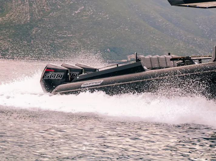 Skipper 42 Triple 500r Yacht Photos Pics Skipper-BSK 42 boat cruising on water, showcasing powerful engines, 2026 model.