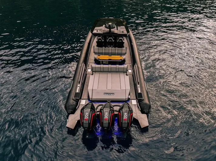 Skipper 42 Triple 500r Yacht Photos Pics Skipper-BSK 42 boat, 2026 model, with triple outboard engines on water.