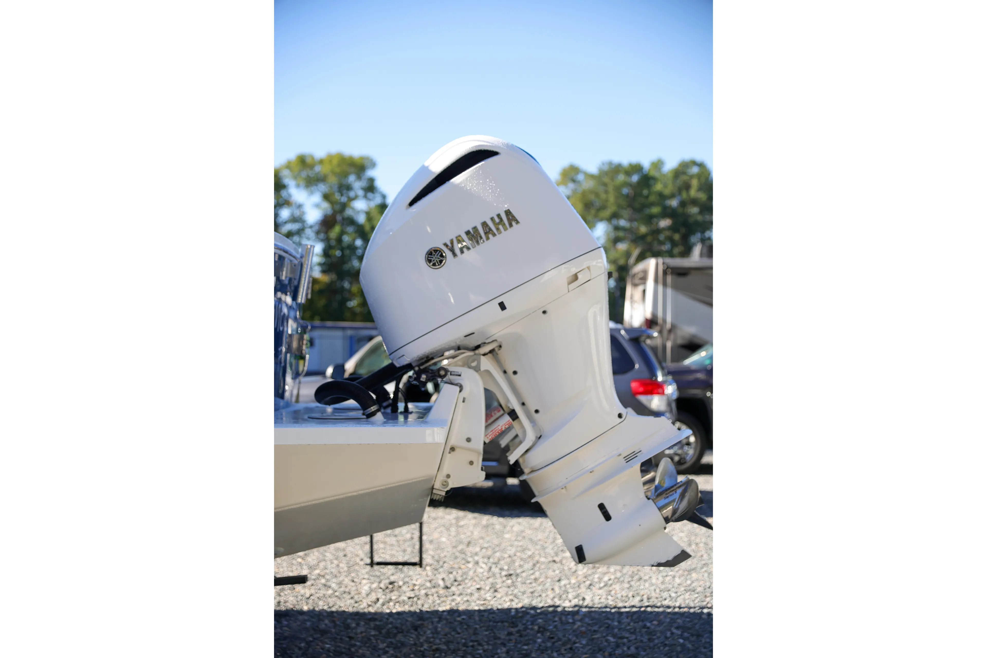  Yacht Photos Pics Yamaha outboard motor on a 2019 Regulator 28 boat, parked outdoors.