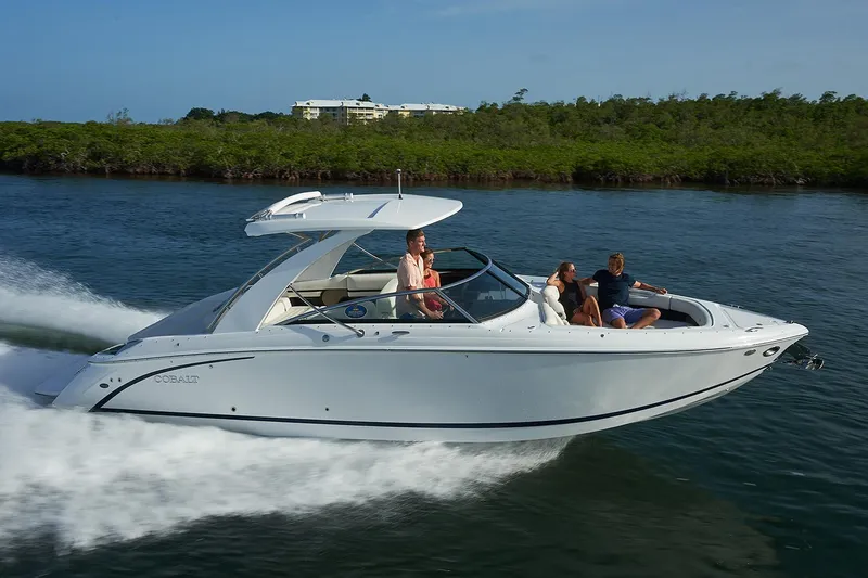  Yacht Photos Pics Manufacturer Provided Image: 2020 Cobalt R30 boat cruising on water with passengers.