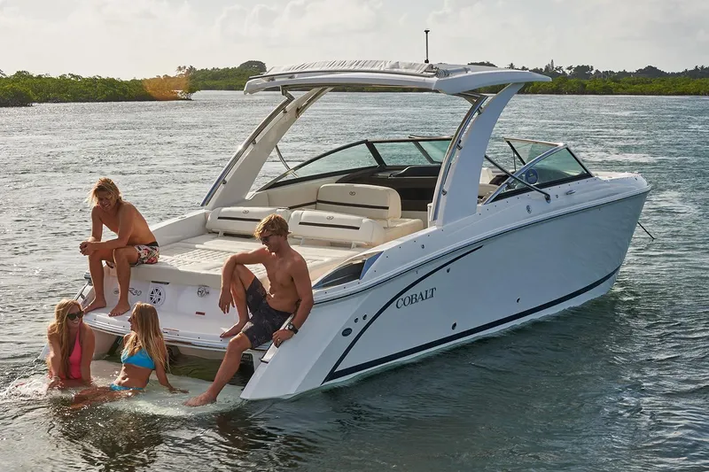  Yacht Photos Pics Manufacturer Provided Image: 2020 Cobalt R30 boat with people enjoying water activities.