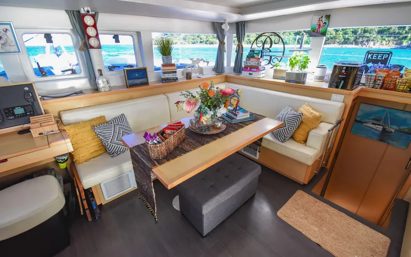 Whiskey Business Yacht Photos Pics Luxurious interior of 2015 Lagoon 450F catamaran with elegant seating and decor.