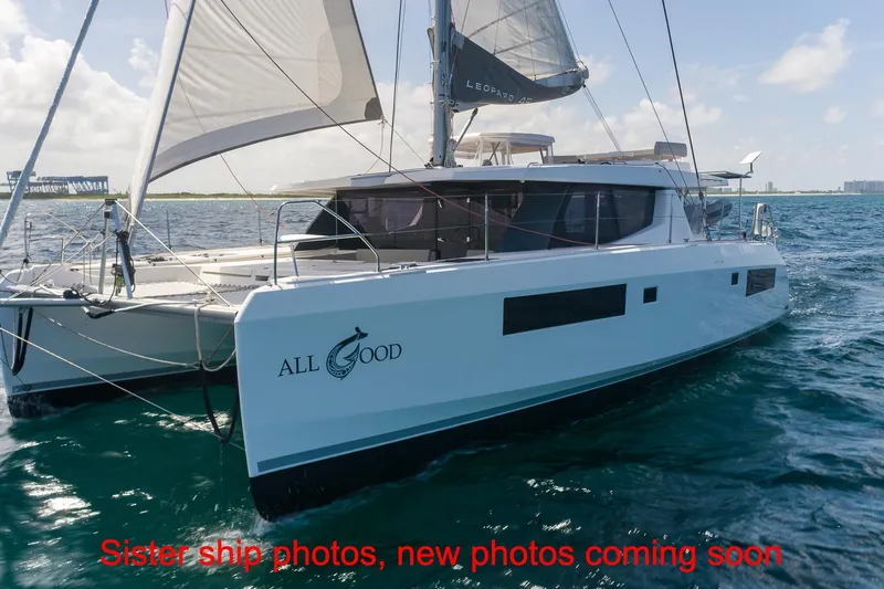 Just Lion Around Yacht Photos Pics 2020 Leopard 45 catamaran "All Good" sailing on open water, sunny day.