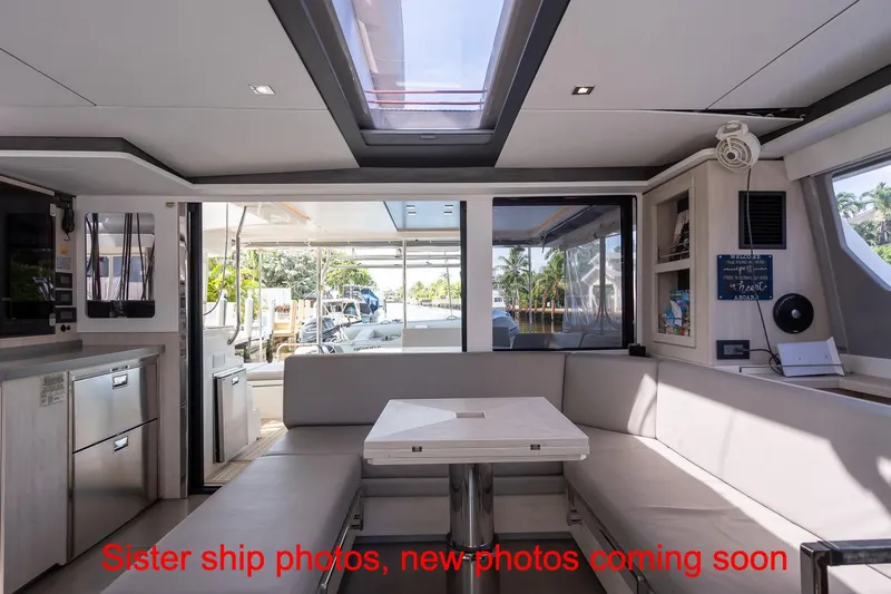 Just Lion Around Yacht Photos Pics Interior of 2020 Leopard 45 catamaran with modern seating and skylight.