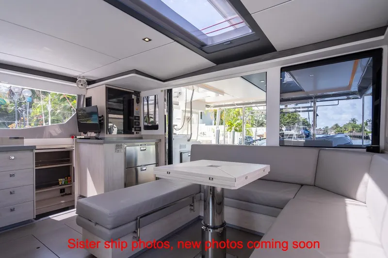 Just Lion Around Yacht Photos Pics Modern interior of 2020 Leopard 45 catamaran with sleek design and ample seating.