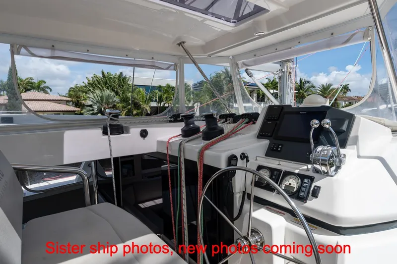 Just Lion Around Yacht Photos Pics Interior view of 2020 Leopard 45 yacht cockpit with navigation controls.