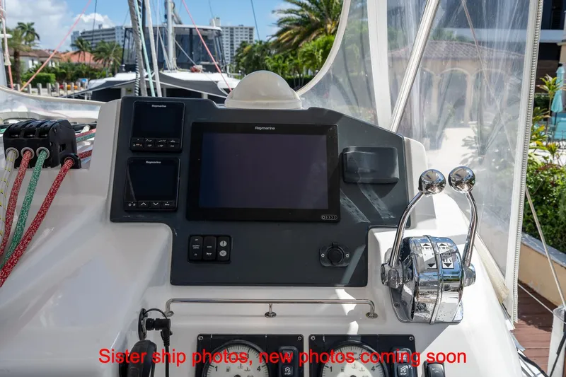Just Lion Around Yacht Photos Pics Cockpit of 2020 Leopard 45 catamaran with navigation controls and display screens.