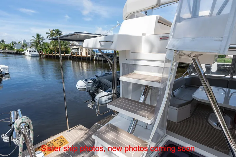 Just Lion Around Yacht Photos Pics 2020 Leopard 45 yacht with outdoor seating and water view.