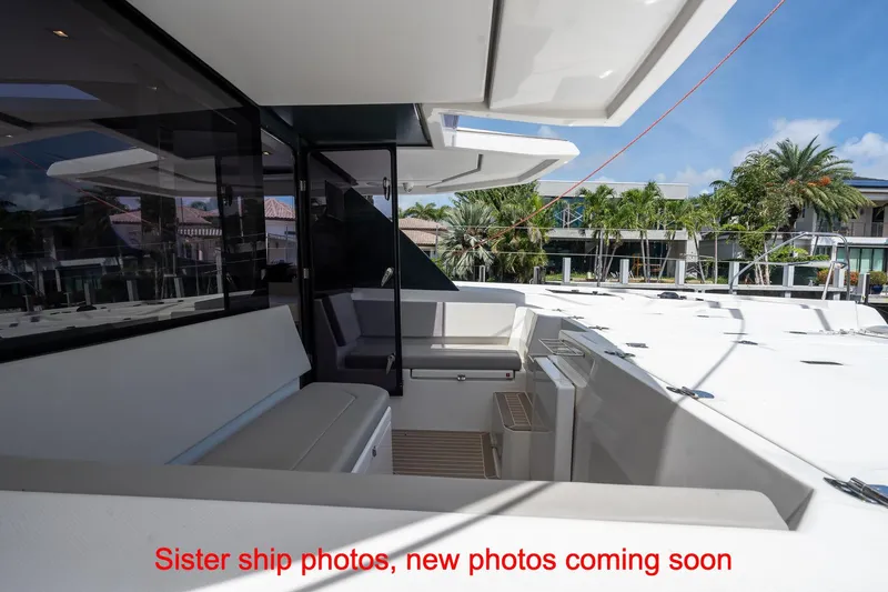 Just Lion Around Yacht Photos Pics Leopard 45 yacht deck with seating area, 2020 model, tropical backdrop.