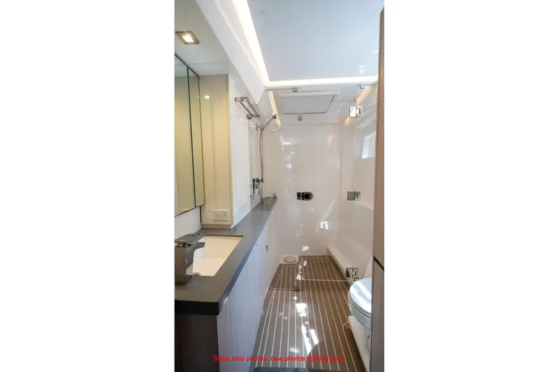 Just Lion Around Yacht Photos Pics Modern bathroom interior on 2020 Leopard 45 yacht, featuring sleek design and fixtures.