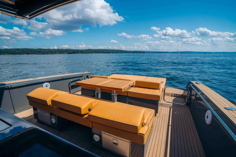  Yacht Photos Pics Luxurious 2024 Pardo Yachts P43 deck with tan seating, overlooking serene ocean view.