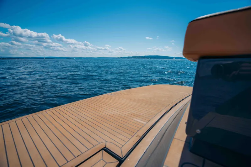 Yacht Photos Pics 2024 Pardo Yachts P43 deck overlooking serene ocean under clear blue sky.