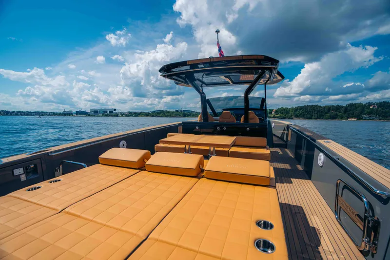  Yacht Photos Pics 2024 Pardo Yachts P43 on water, featuring spacious deck and luxurious seating.