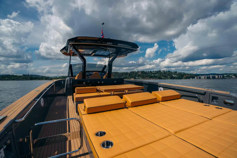  Yacht Photos Pics 2024 Pardo Yachts P43 with spacious deck and luxurious seating on open water.