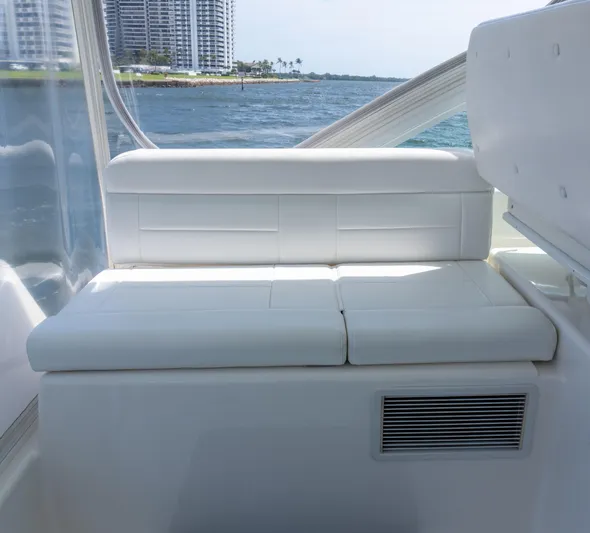 Miss Shell Yacht Photos Pics White seating area on a 2008 Cabo 38 Express boat with ocean view.