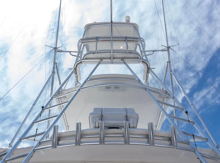 Miss Shell Yacht Photos Pics 2008 Cabo 38 Express yacht tower against a blue sky.