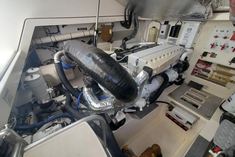 Miss Shell Yacht Photos Pics Engine room of a 2008 Cabo 38 Express boat with visible machinery and components.