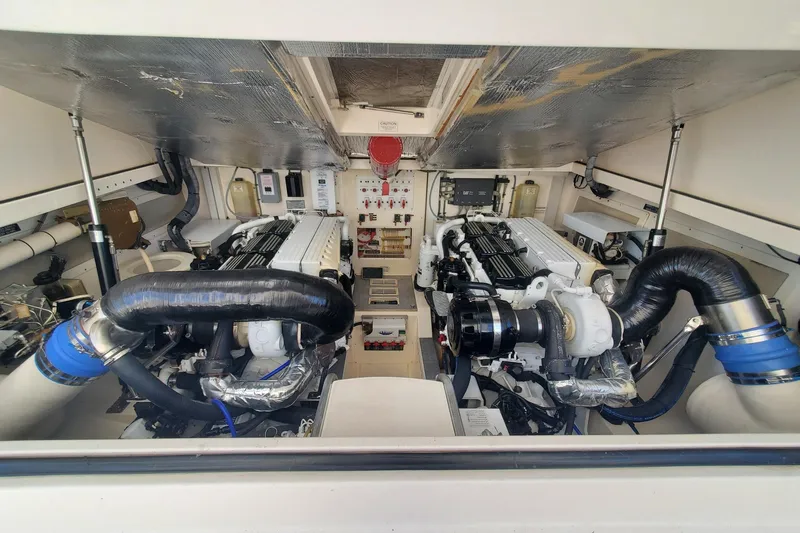 Miss Shell Yacht Photos Pics Engine room of a 2008 Cabo 38 Express boat with twin engines.