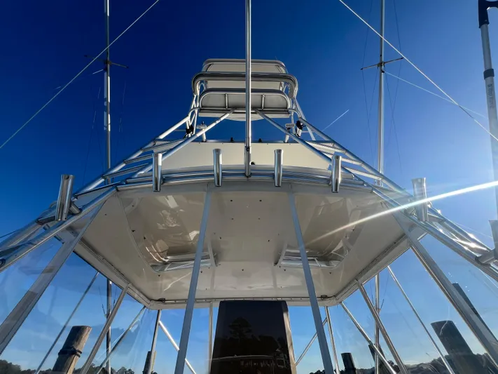 Precedent Yacht Photos Pics 1998 Jersey Cape 36 Express boat tower against clear blue sky.