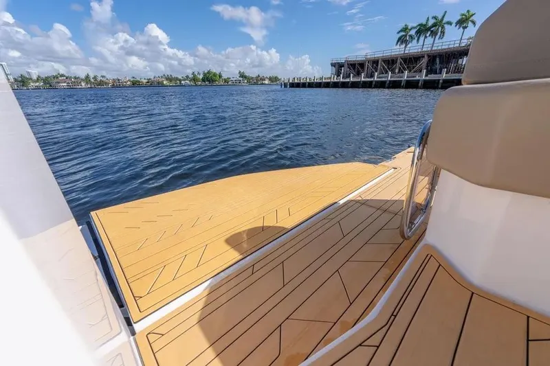  Yacht Photos Pics Luxury boat deck on water, Hanover 347 model, 2025, with scenic waterfront view.