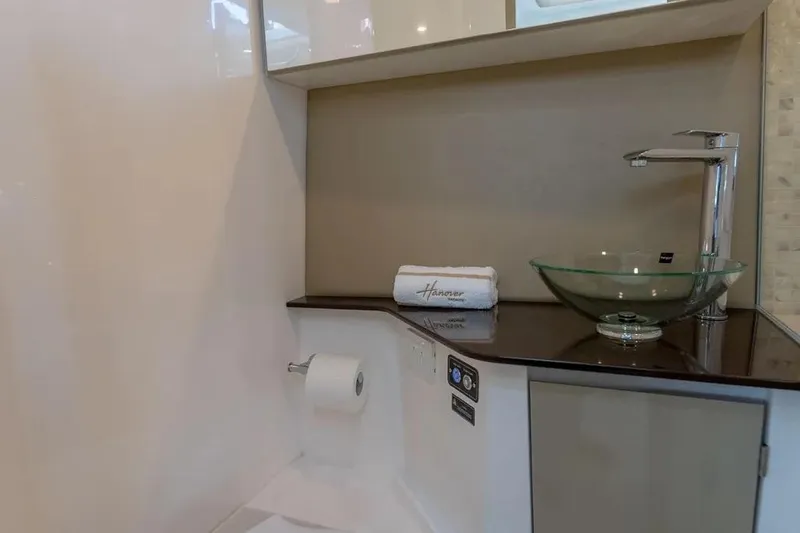  Yacht Photos Pics Modern bathroom sink with glass bowl and chrome faucet in Hanover 347, 2025 model.