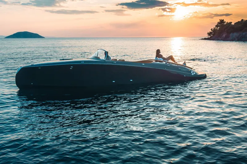  Yacht Photos Pics 2025 Seven Seas Yachts Venus Speedster X, 32ft, cruising at sunset on serene waters.