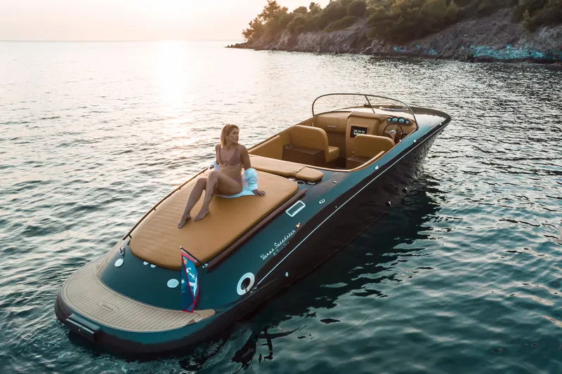  Yacht Photos Pics 2025 Seven Seas Yachts Venus Speedster X 32ft on serene water at sunset.