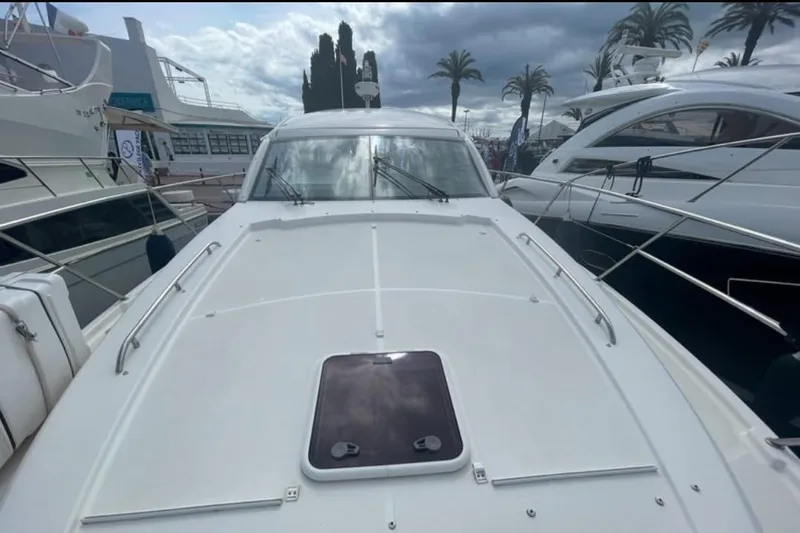  Yacht Photos Pics 2009 Prestige 38S yacht docked, showcasing sleek design and spacious deck.