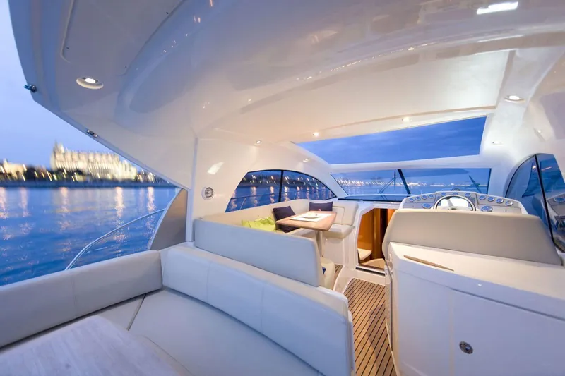  Yacht Photos Pics Luxurious interior of 2009 Prestige 38S yacht with scenic waterfront view.