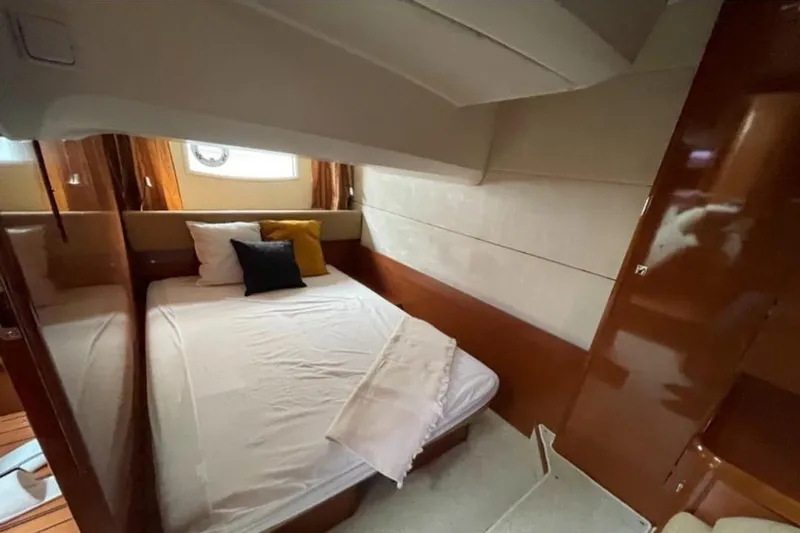  Yacht Photos Pics Luxurious cabin interior of 2009 Prestige 38S yacht with cozy bedding.
