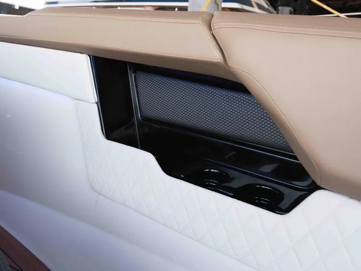  Yacht Photos Pics Luxurious interior detail of 2019 Sea Ray SLX 400 boat with beige and white upholstery.