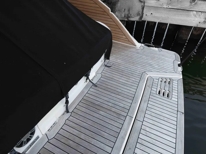  Yacht Photos Pics 2019 Sea Ray SLX 400 swim platform with teak decking and black cover.
