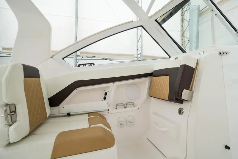  Yacht Photos Pics Interior of 2022 Edgewater 262 CX boat with beige and white seating.