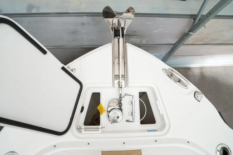  Yacht Photos Pics 2022 Edgewater 262 CX boat anchor system and storage compartment.