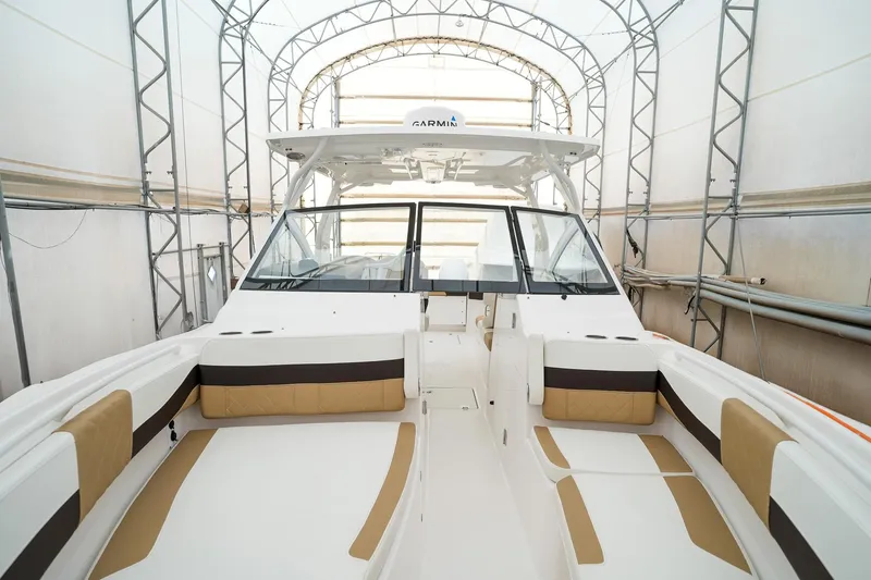  Yacht Photos Pics 2022 Edgewater 262 CX boat interior with spacious seating and modern design.