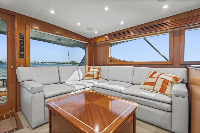 Blacksmith Yacht Photos Pics Luxurious interior of 2008 Hatteras 60 Convertible yacht with plush seating and ocean view.