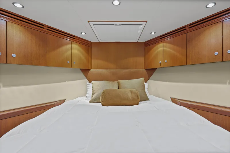 Blacksmith Yacht Photos Pics Luxurious cabin interior of 2008 Hatteras 60 Convertible yacht with wood cabinetry.