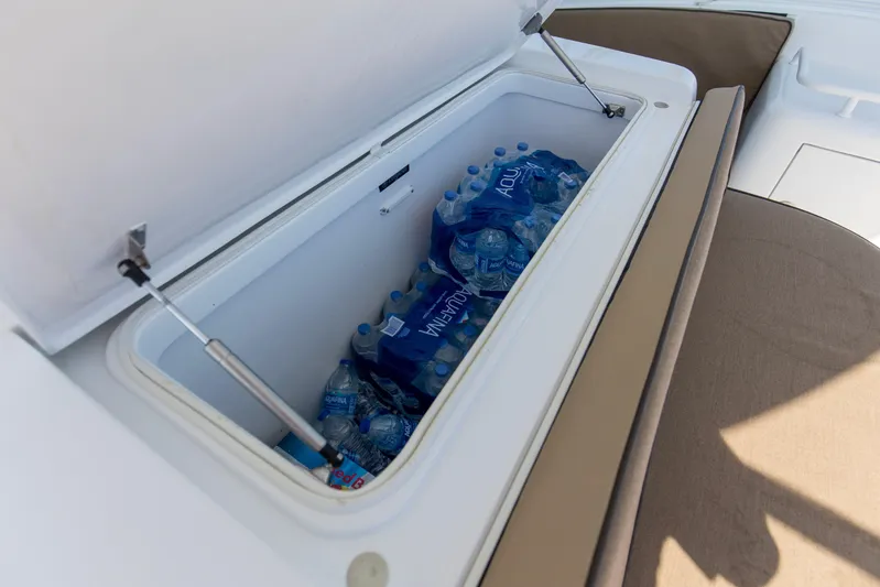 Blacksmith Yacht Photos Pics Open cooler on 2008 Hatteras 60 Convertible yacht, filled with bottled water.