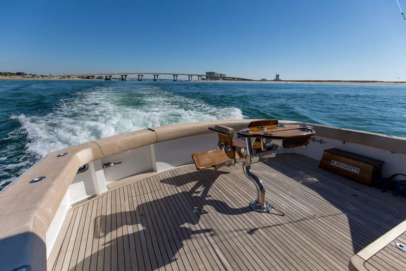 Blacksmith Yacht Photos Pics 2008 Hatteras 60 Convertible yacht cruising with scenic ocean view.