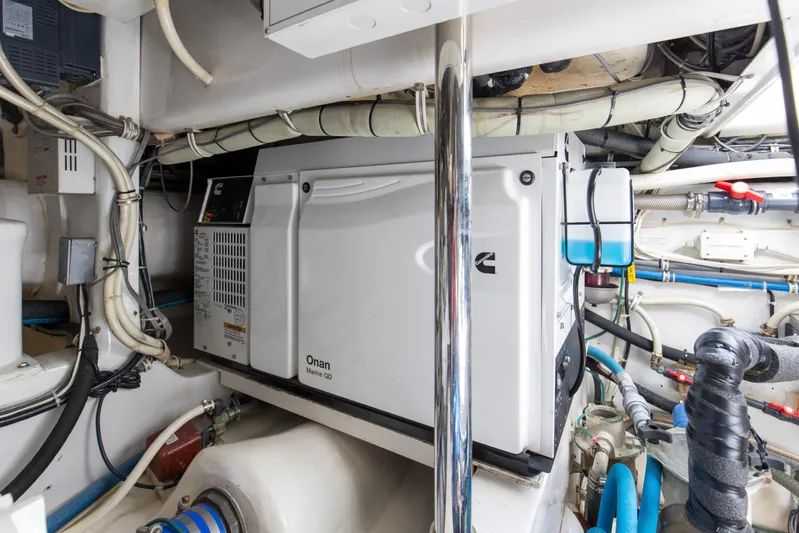 Blacksmith Yacht Photos Pics Engine room of 2008 Hatteras 60 Convertible with Onan Marine generator.
