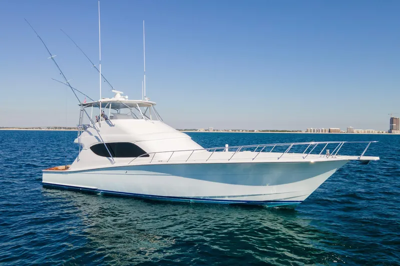 Blacksmith Yacht Photos Pics 2008 Hatteras 60 Convertible yacht on open water, clear sky background.