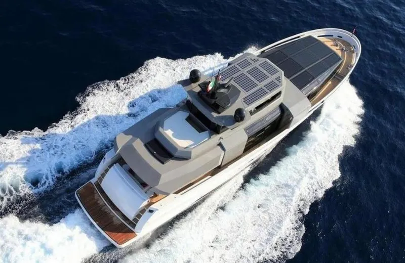  Yacht Photos Pics Aerial view of 2017 Arcadia Yachts 100 model cruising on the ocean.
