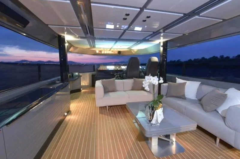  Yacht Photos Pics Luxurious interior of 2017 Arcadia Yachts 100 with modern seating and panoramic views.