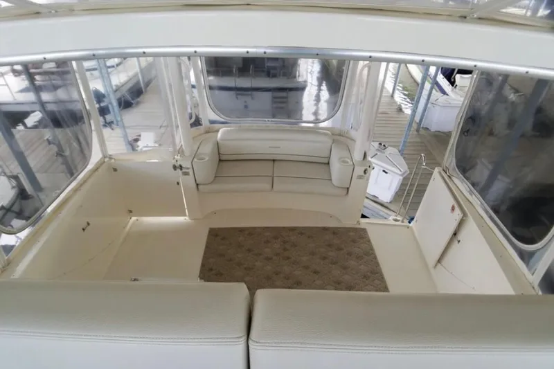  Yacht Photos Pics 2006 Silverton 35 Motor Yacht interior with spacious seating and panoramic windows.