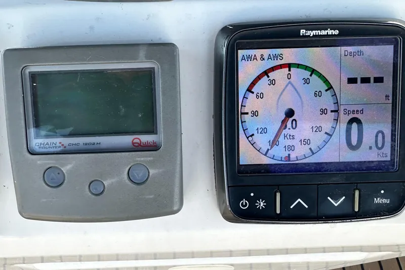 Serendipity Yacht Photos Pics Control panel of 2014 Jeanneau Sun Odyssey 469 with navigation instruments.