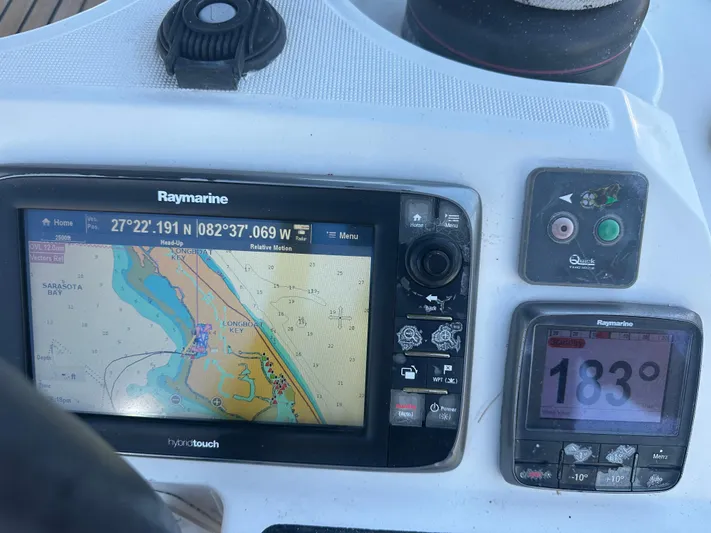 Serendipity Yacht Photos Pics Navigation system on 2014 Jeanneau Sun Odyssey 469 sailboat, displaying coordinates and heading.