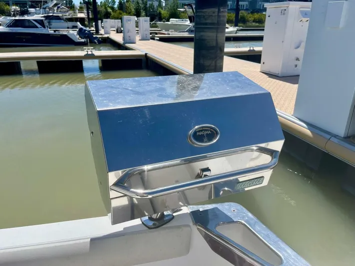  Yacht Photos Pics Stainless steel Magma grill on a 2001 Carver 404 boat at a marina.