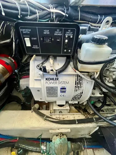  Yacht Photos Pics Engine room of 2001 Carver 404 with Kohler power system and control panel.