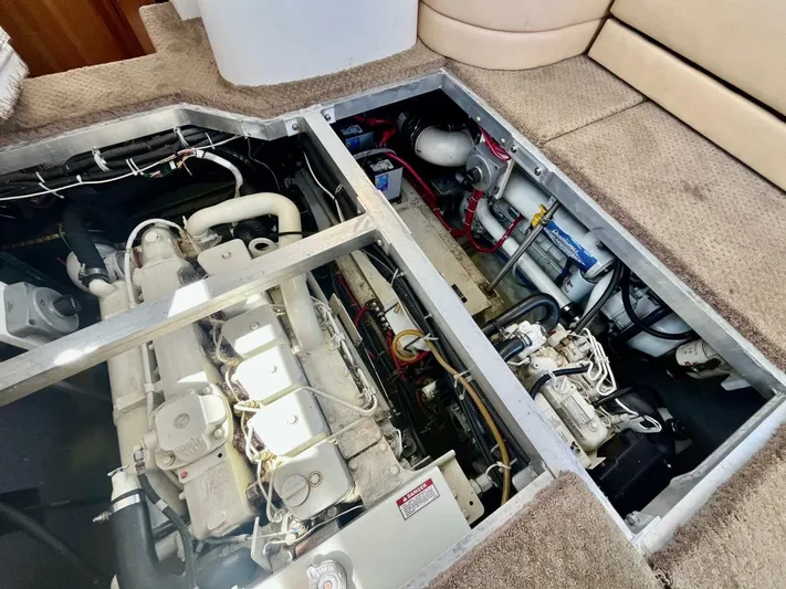  Yacht Photos Pics Engine compartment of a 2001 Carver 404 yacht, showcasing mechanical components and wiring.